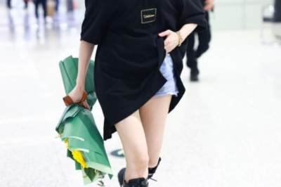 张天爱黑色连衣裙配长靴飒酷时尚